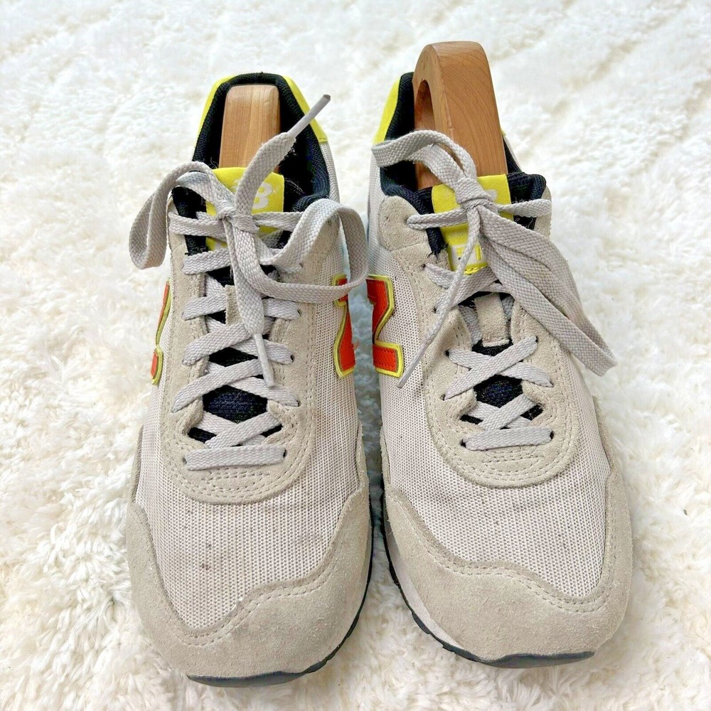 New Balance 515 Gray Athletic Sneakers with Yellow and Red Accents